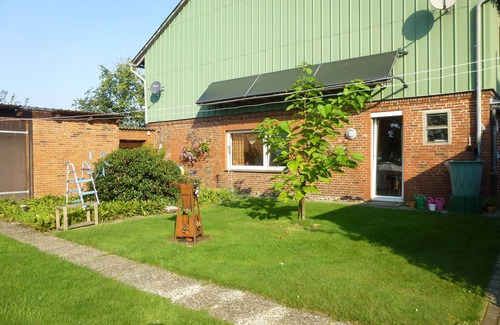Erfde Apartment | Ground floor apartment with sun terrace - Ferienwohnung Stöterau