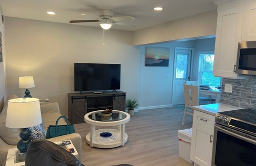 Englewood Condo | Ground floor Bay front, heated pool, dock, private beach access onsite.n
