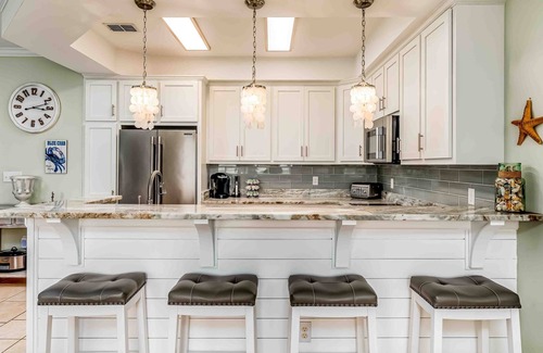 Dauphin Island Condo | Ground-floor condo next to on-site pool with private patio & beach access