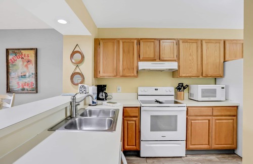 Butler Beach Condo | Ground-floor condo next to the tennis courts with 2 pools, sauna, beach access