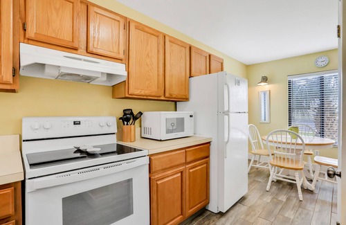 Butler Beach Condo | Ground-floor condo next to the tennis courts with 2 pools, sauna, beach access