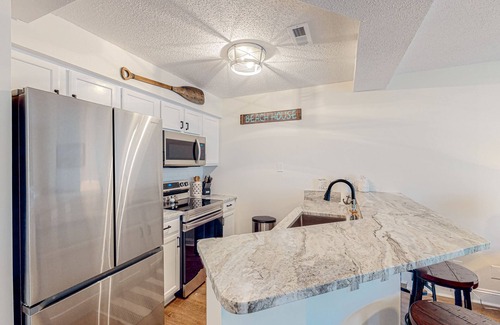 Sunset Beach Condo | Ground-floor condo with patio, hot tub, in/outdoor pools, gym, washer/dryer, AC