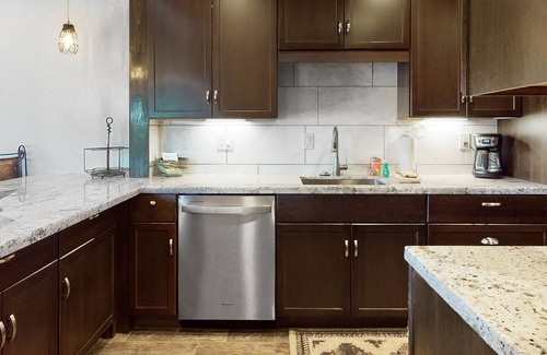Carefree Condo | Ground-floor condo with on-site pool, grills, patio, & central AC