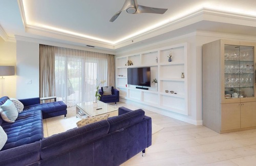 Seven Mile Beach Condo | Ground Floor Garden View Residence 101 Ritz Carlton Residences 3 Bedroom Condo by RedAwning