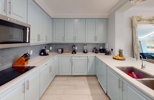 Seven Mile Beach Condo | Ground Floor Garden View Residence 101 Ritz Carlton Residences 3 Bedroom Condo by RedAwning