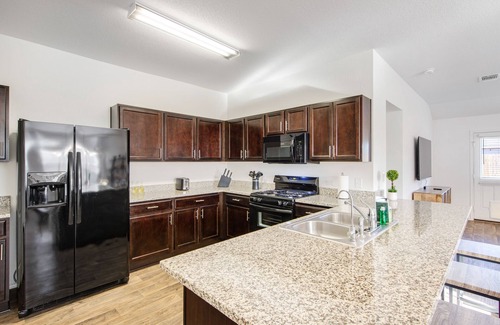 Austin House | Ground-floor home with foosball table, washer/dryer, AC, enclosed patio & WiFi