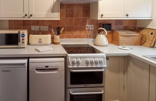 Gayle Cottage | Ground Floor: nLiving room: TV, Freesat, Open FirenDining room.