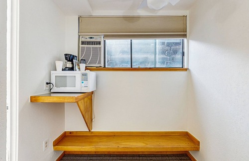 West End Cabin | Ground-floor room on Main St - pool & hot tub - walk to lifts, dog-friendly