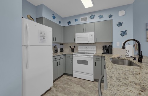 Panama City Beach Condo | Ground floor poolside! 2024 Under New Management!