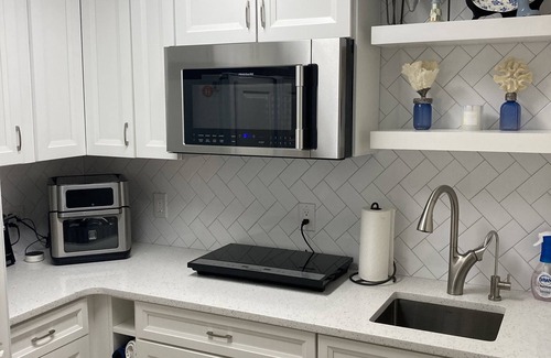 Osprey Village Apartment | Ground Floor, walking distance to fishing pier, restaurants & shopping.
