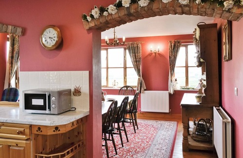 Burythorpe Cottage | Ground Floor: nLiving room: TV, Open FirenDining room.