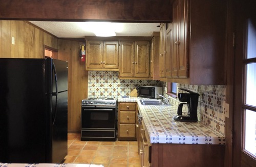 New Braunfels Cabin | Guadalupe River Road Retreat Southwestern Cabin