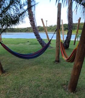 Guarajuba Apartment | Guarajuba feitoparavoce - Lindo flat, conforto e lazer na beira do lago, próximo a praia, na melhor localização de Guarajuba