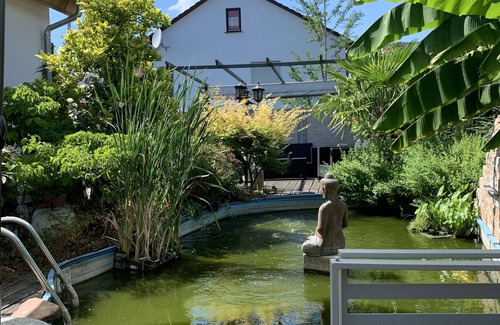 Dudenhofen Apartment | Guest apartment near Speyer with beautiful terrace by the koi pond