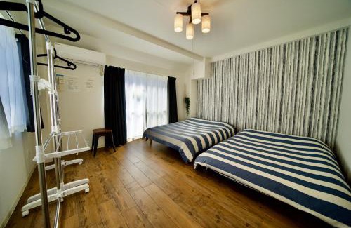 Nishi Ward Apartment | Guest House Re-worth Joshin1 4F