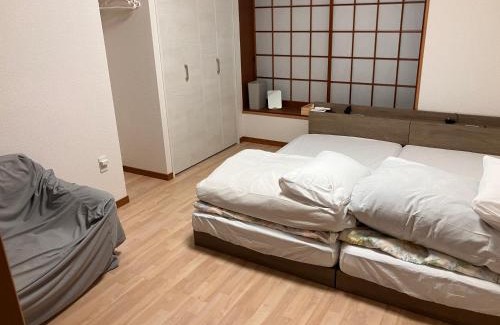 Minamata House | Guest House Tomimori