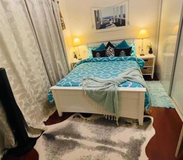 Altona North House | Guest room with private bathroom and living space