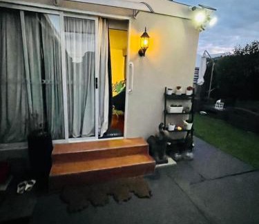 Altona North House | Guest room with private bathroom and living space