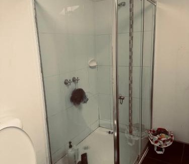 Altona North House | Guest room with private bathroom and living space