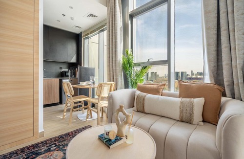 Jumeirah Village Circle Apartment | GuestReady - Arabic Charm | Balcony | Regina Tower