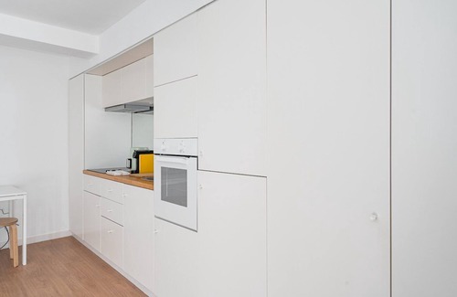 Guimaraes Apartment | GuestReady - Modern Stone Loft - Guimarães