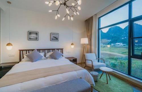 Qianxinan Buyei and Miao Hotel | Gui zhou Wan Feng Lin Eave Boutique Hotel