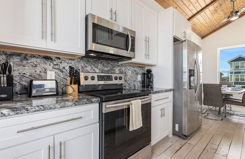 Pointe San Luis House | Gulf view beauty with vaulted ceilings, quick beach access, & community pool