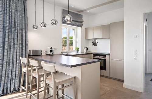 Kletkamp Apartment | GUT KLETKAMP "Mühlenhof 5" - Ruhige Ferienwohnung mit 3 Schlafzimmern I Terrasse mit See- & Naturblick I Gemeinschaftsgarten I 15 Min zur Ostsee I Küche I Parkplatz I Waschmaschine I WLAN