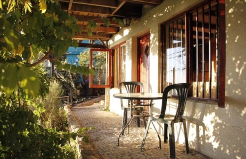 Placeres Apartment | Habitación con baño, cocina y patio privado