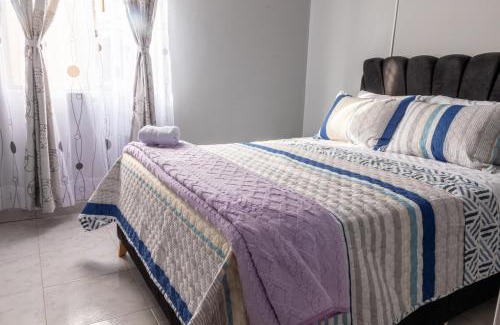 Calle 26 Hotel | Habitación Privada en Kzona, Cerca al aeropuerto, Ideal para Escalas y Trámites