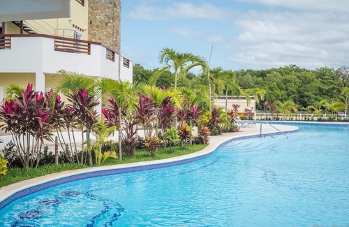 Dixon Cove Apartment | Habitacion para 2 con acceso a playa privada.