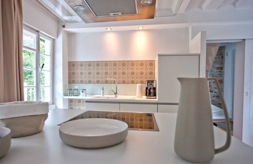 Monschau House | Half-timbered house 18th century, modern design, terrace, river property