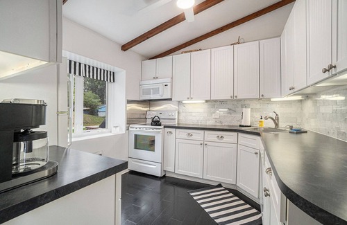 Ludington Cottage | Hamlin Lake 3 Bedroom, 2 Bath Vintage Cottage with Private Lake Frontage