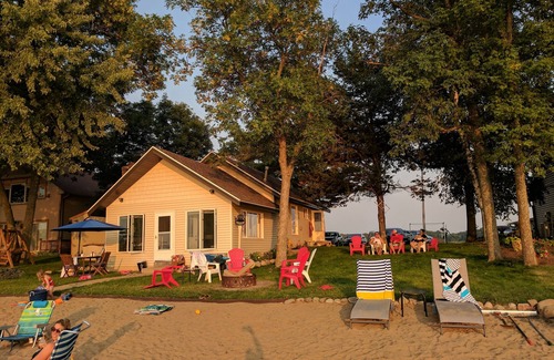 Lindstrom Cabin | Hamptons style Lake house on Sunset point. With water on both the east and west!