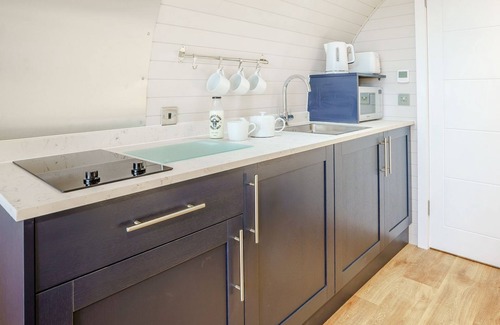 Whitland Cottage | Hand picked for its stunning countryside views and private Scandinavian log fired hot tub.