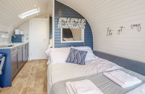 Whitland Cottage | Hand picked for its stunning countryside views and private Scandinavian log fired hot tub.