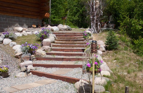 Marcell Cabin | Handcrafted log lodge on Minnesota’s clearest lake. Nestled in the woods.