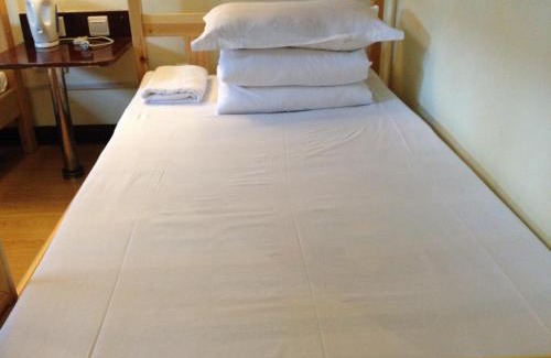 Dongsi Hotel | Happy Dragon Alley Hotel-In the city center close to the subway&free coffe laundry Fluent English speaking,Tourist attractions ticket service&food recommendation,Near Tian Anmen Forbiddencity,Near Lama temple,Easy access to the airport