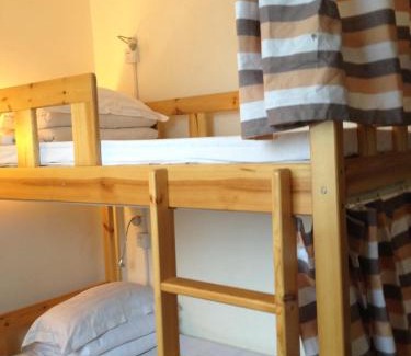 Dongsi Hotel | Happy Dragon Alley Hotel-In the city center close to the subway&free coffe laundry Fluent English speaking,Tourist attractions ticket service&food recommendation,Near Tian Anmen Forbiddencity,Near Lama temple,Easy access to the airport