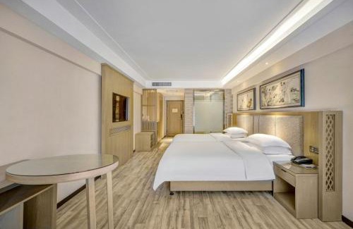 Nangang Qu Hotel | Happy Manju Hotel-Harbin Haxi High-speed Railway West Station Wanda Plaza Branch