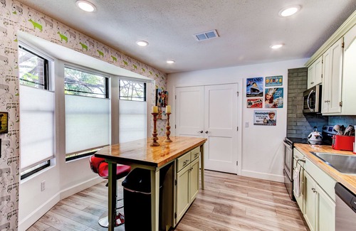 Sanford House | Happy Palette Home: Close to downtown+the lake! Fenced yard with outdoor dining