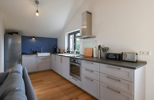 Hopfen am See Apartment | Happy Place - Modern penthouse with the best view of Lake Hopfensee & the mountains