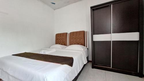 Saringan Hotel | Harisha Homestay Sawah Lunto Syariah Redpartner