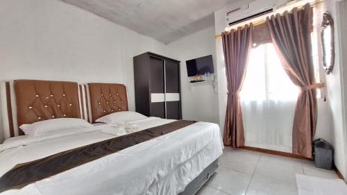 Saringan Hotel | Harisha Homestay Sawah Lunto Syariah Redpartner