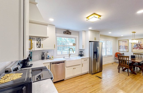 Heron Walk House | Harmonizing home with firepit, patio, deck, full kitchen, TV, and washer/dryer