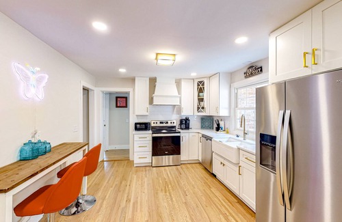 Heron Walk House | Harmonizing home with firepit, patio, deck, full kitchen, TV, and washer/dryer