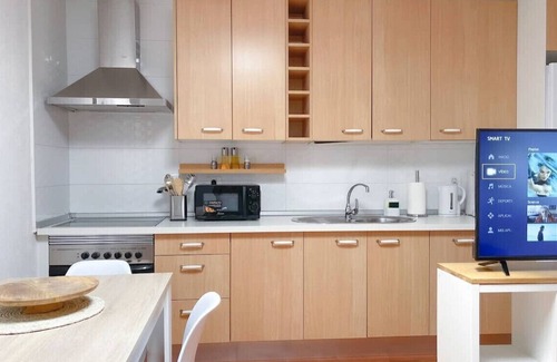 Telde Ski Chalet | Harmony Beach House - 2BR Sea Views Terrace