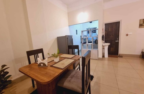 Sualkuchi Apartment | Harmony Hideaway, offers a cozy retreat with an attached kitchen.