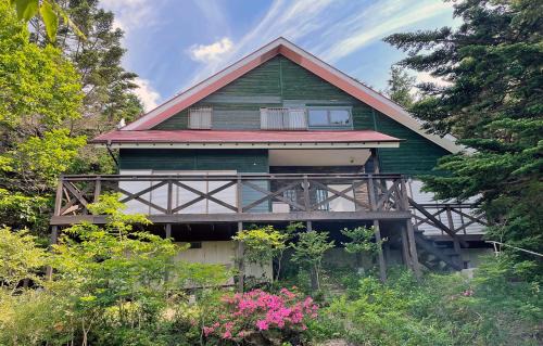 Nasu House | HARUNA SKY Panoramic view of Nasu,private space surrounded by fir trees,relaxing stone bath,watching movies on a 120inch big screen