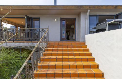 Waipahihi House | Harvey Lake House - stylish comfort with outdoor deck and lake views